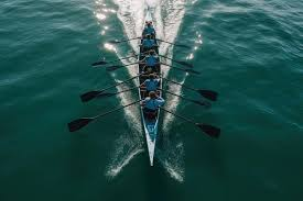 Rowing team working in perfect synchronization